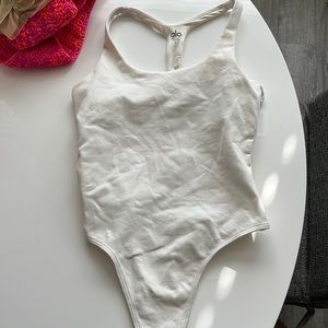 Alo white bodysuit size small. Worn once